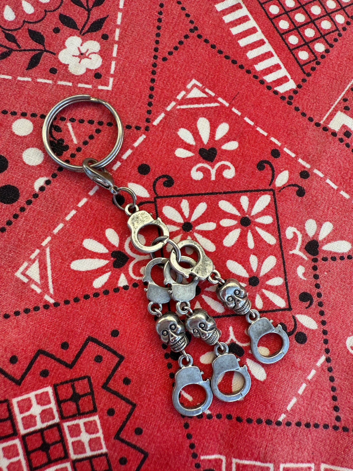 vintage skull and handcuff charm with lobster claw clasp (MA)
