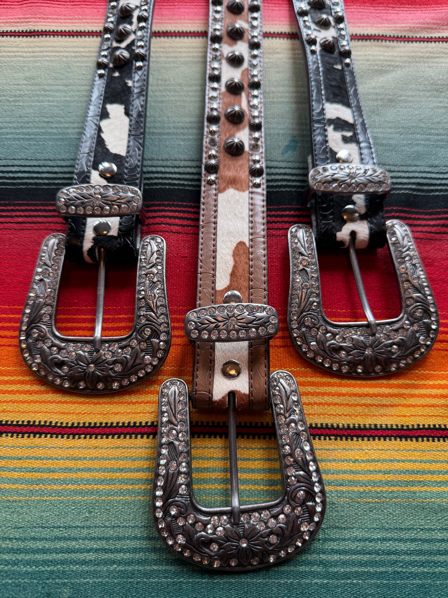 Assorted $125 Cow Print Belts