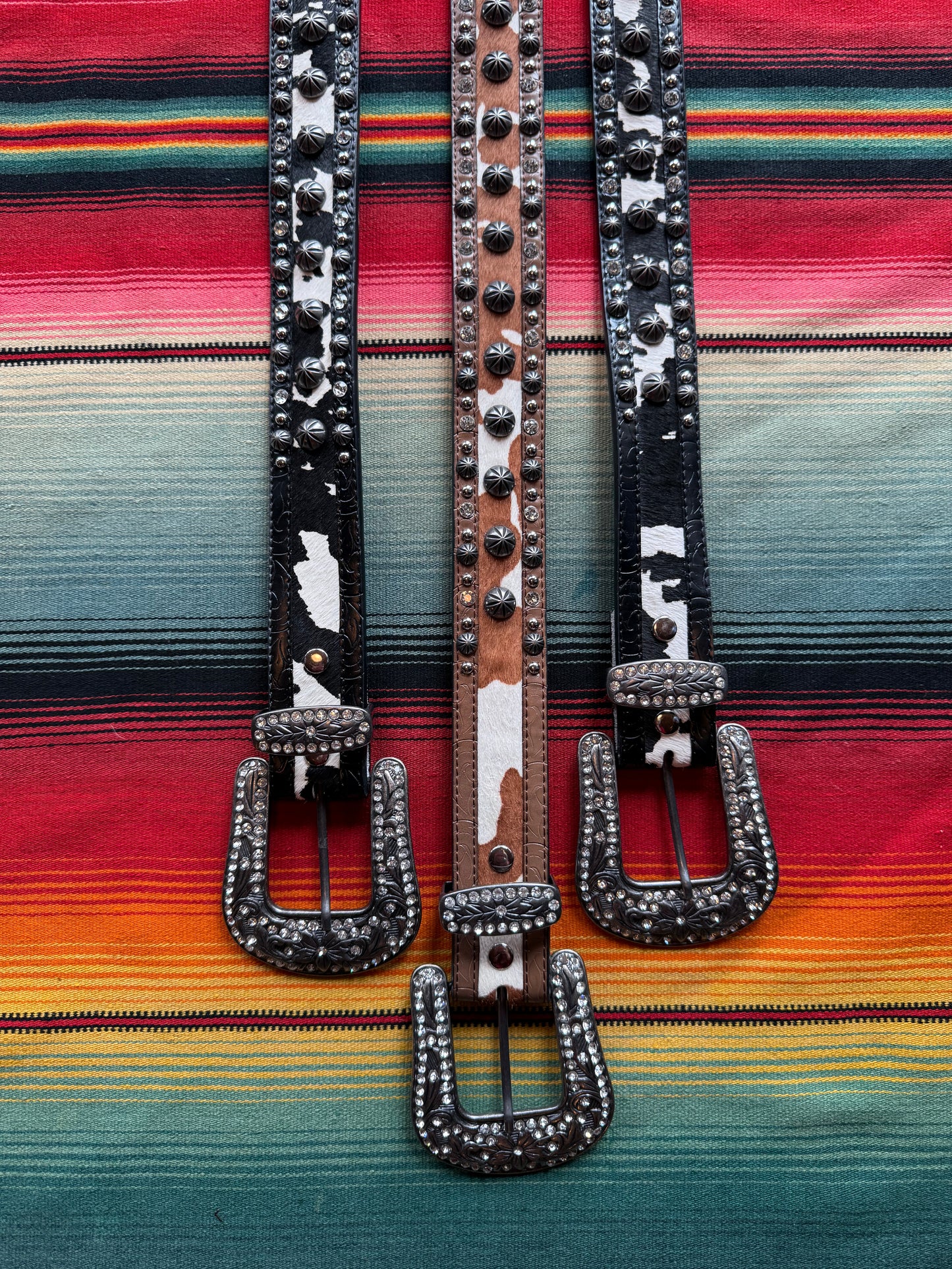 Assorted $125 Cow Print Belts
