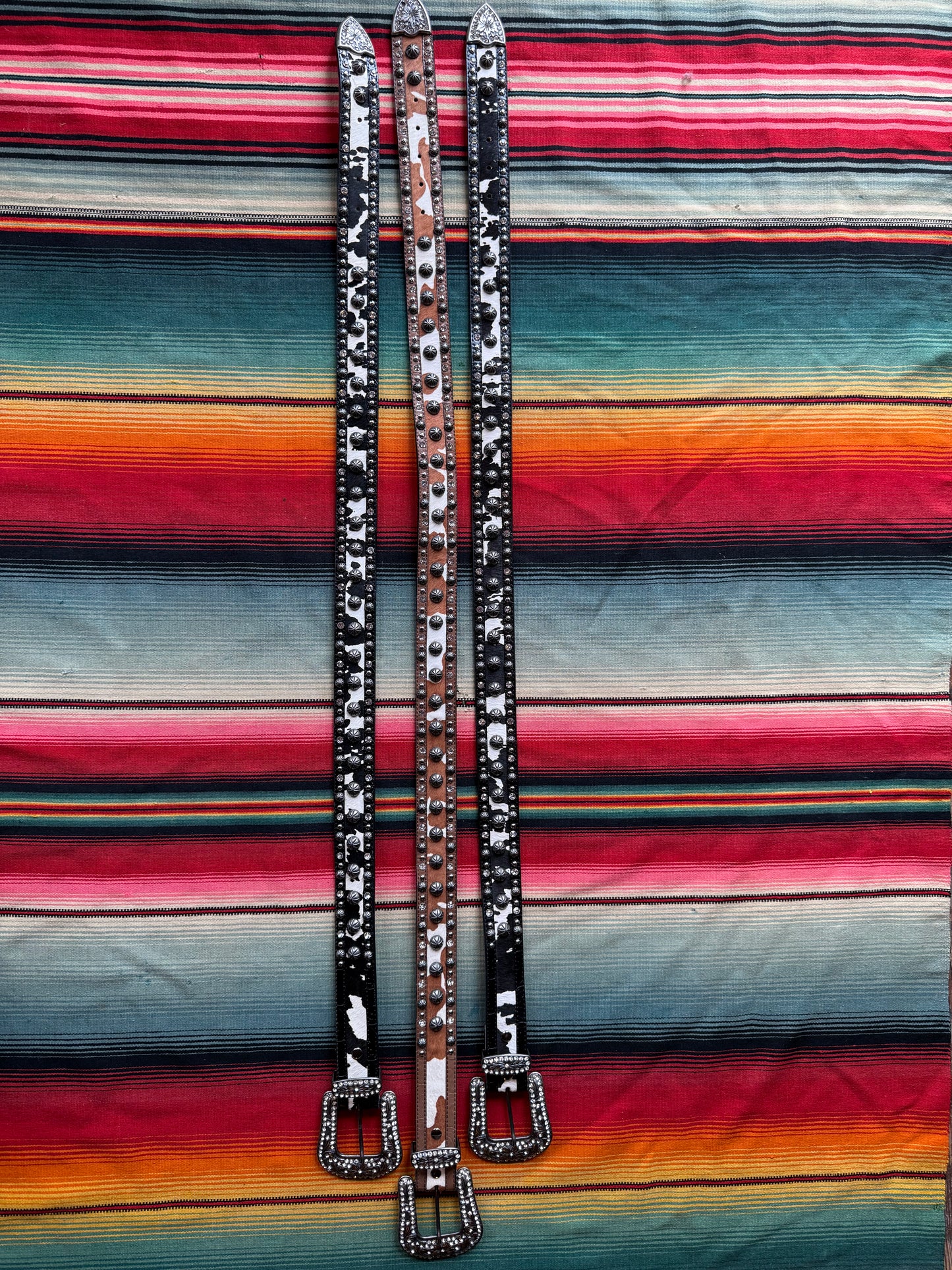 Assorted $125 Cow Print Belts